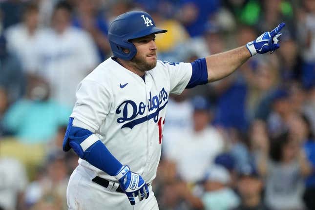 Jul 3, 2023; Los Angeles, California, USA; Los Angeles Dodgers third baseman Max Muncy (13) reacts after hitting a solo home run in the second inning against the Pittsburgh Pirates at Dodger Stadium.