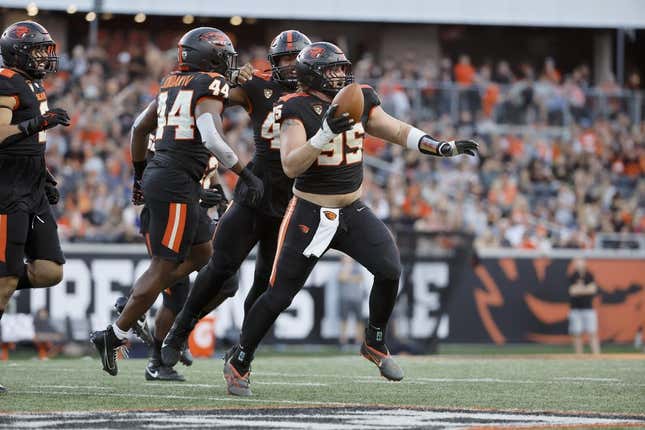 Sep 9, 2023; Corvallis, Oregon, USA; Oregon State Beavers defensive lineman Isaac Hodgins (99) celebrates after recovering a fumble against the UC Davis Aggies during the first half at Reser Stadium.