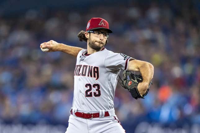 Jul 15, 2023; Toronto, Ontario, CAN; Arizona Diamondbacks starting pitcher Zac Gallen (23) pitches to the Toronto Blue Jays during the first inning at Rogers Centre.
