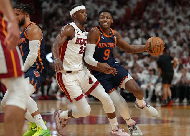 May 12, 2023; Miami, Florida, USA; New York Knicks guard RJ Barrett (9) drives around Miami Heat forward Jimmy Butler (22) in the first half during game six of the 2023 NBA playoffs at Kaseya Center.