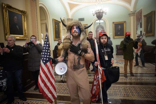 Image for article titled &#39;QAnon Shaman&#39; Sentenced to 41 Months in Prison for Failed Coup on Jan. 6