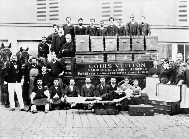 Louis Vuitton’s workshop circa 1888, grandson Gaston is reclined.