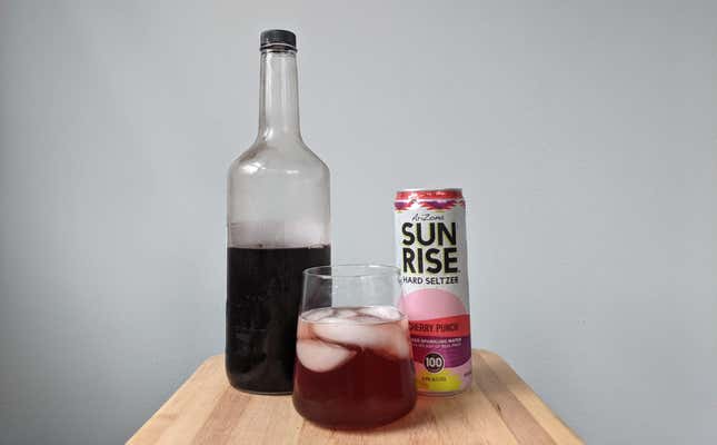 Bottle of cherry juice, can of cherry hard seltzer, and a glass of the two over ice