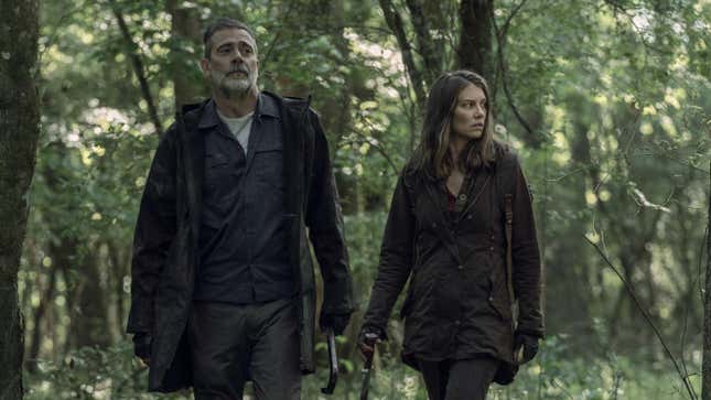 Negan and Maggie walk in a forest in The Walking Dead.