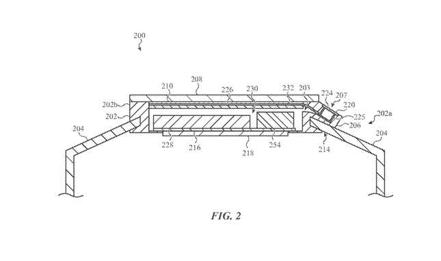 This design shows the camera sitting in a ‘protrusion’ outside the watch face sitting flush with the watch band.