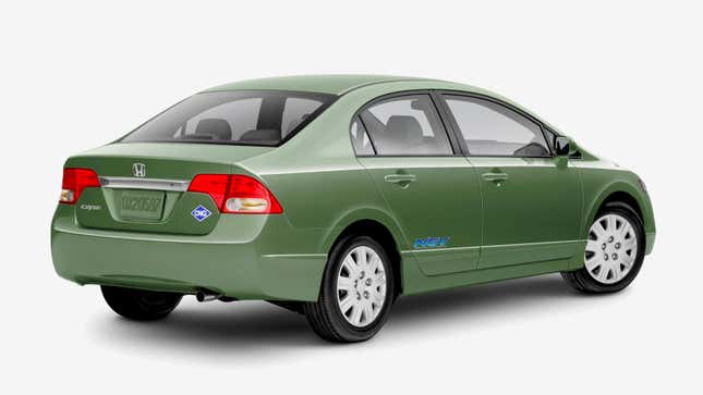 A photo of a green Honda Civic GX sedan with "cng' badges on it. 