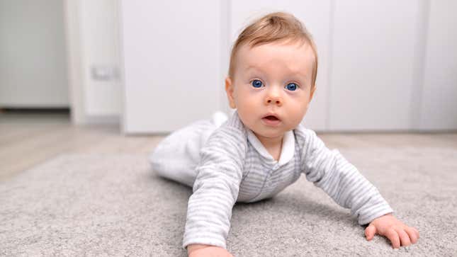 Image for article titled Bored Baby Wishes It Had Something To Choke On