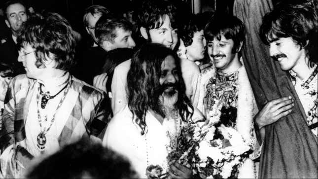 The Beatles with Maharishi Mahesh Yogi, the founder of transcendental meditation.