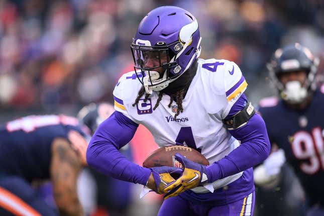 Jan 8, 2023; Chicago, Illinois, USA; Minnesota Vikings running back Dalvin Cook (4) runs the ball during the first quarter against the Chicago Bears at Soldier Field.