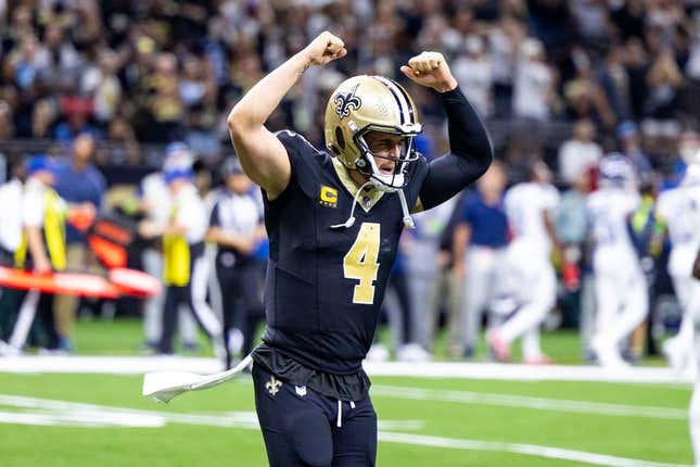 Sep 10, 2023; New Orleans, Louisiana, USA;  New Orleans Saints quarterback Derek Carr (4) celebrate a touchdown pass to New Orleans Saints wide receiver Rashid Shaheed (22) against the Tennessee Titans during the second half at the Caesars Superdome.