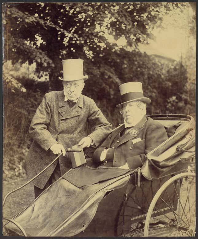 Two Gentlemen, One in Cart,