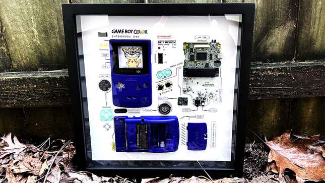A photo of Grid Studio's dissected Game Boy Color in an outdoor setting. 