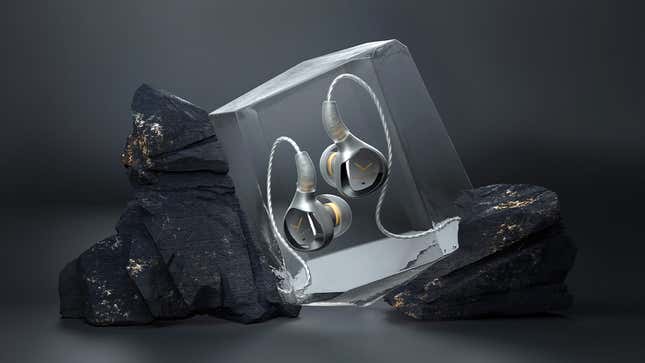 Beyerdynamic's Xelento Wireless earbuds trapped inside a clear crystal.