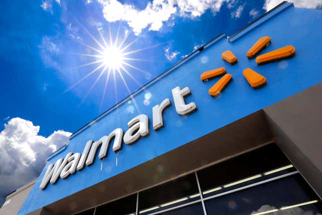 FILE - The entrance to a Walmart store is shown on June 25, 2019 in Pittsburgh. Walmart reports earning on Thursday. (AP Photo/Gene J. Puskar, File)