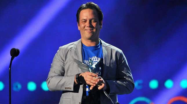 Phil Spencer stands onstage at the 2015 Game Awards.