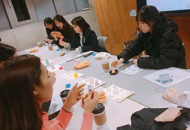 Women attend a discussion session about menstrual cups.