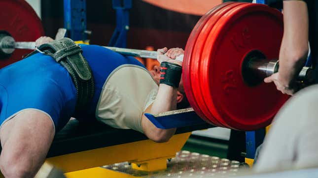 Image for article titled Is It Cheating to Arch Your Back When You Bench Press?