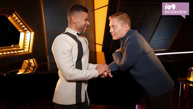 Star Trek: Discovery's Culber and Stamets gaze affectionately at each other in a piano bar aboard a space ship.
