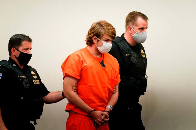 Payton Gendron is led into the courtroom for a hearing at Erie County Court, in Buffalo, N.Y., Thursday, May 19, 2022.