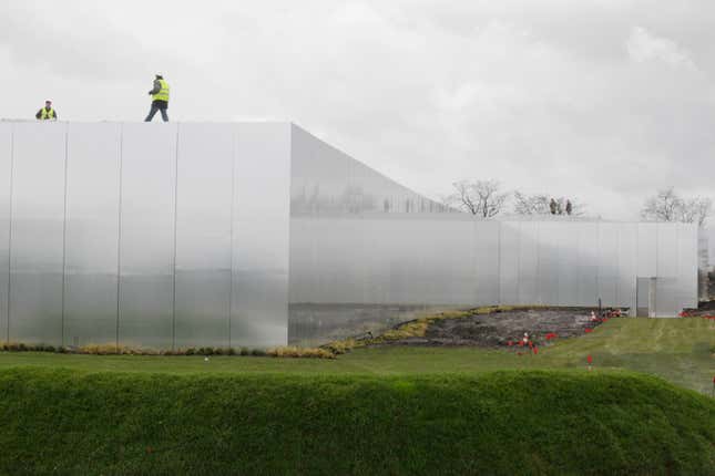 Workmen prepare the site of the Le Louvre Lens Museum in 2012.