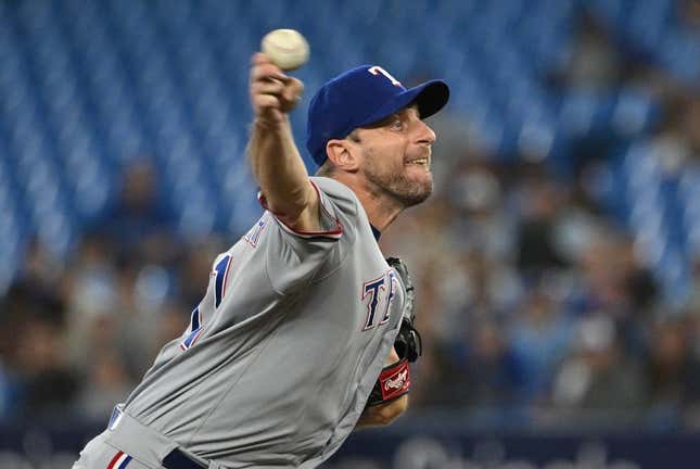 Sep 12, 2023; Toronto, Ontario, CAN;   Texas Rangers starting pitcher Max Scherzer (31) delivers a pitch against the Toronto Blue Jays in the first inning at Rogers Centre.
