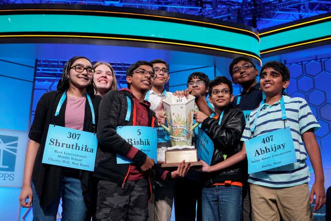Shruthika Padhy, 13, of Cherryhill, New Jersey, Erin Howard, 14, of Huntsville, Alabama, Rishik Gandhasri, 13, of San Jose, California, Christopher Serrao, 13, of Whitehouse Station, New Jersey, Saketh Sundar, 13, Clarksville, Maryland, Sohum Sukhatankar, 13, of Dallas, Texas, Rohan Raja, 13, of Irving, Texas and Abhijay Kodali, 12, of Flower Mound, Texas celebrate their eight-way tie in the final round of the 92nd annual Scripps National Spelling Bee at National Harbor in Oxon Hill, Maryland on May 31.