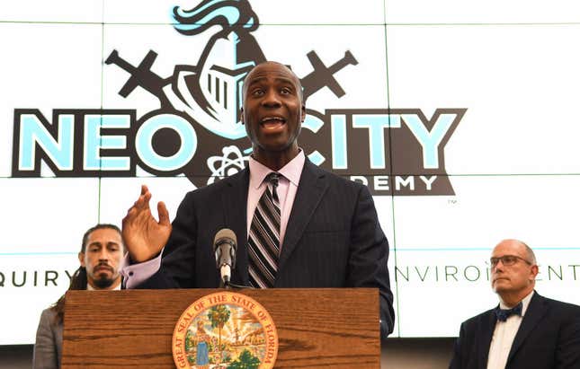 Newly-appointed state Surgeon General Dr. Joseph Ladapo speaks during a press conference at Neo City Academy in Kissimmee, Florida. 