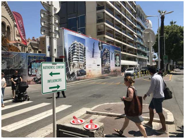 Image for article titled At the world’s most famous ad fest, street signs warn against influencer content