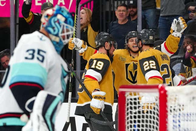Apr 11, 2023; Las Vegas, Nevada, USA; Vegas Golden Knights right wing Michael Amadio (22) celebrates with Vegas Golden Knights right wing Reilly Smith (19) and Vegas Golden Knights center William Karlsson (71) after scoring against the Seattle Kraken during the second period at T-Mobile Arena.