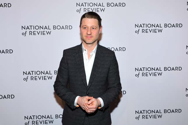 Ben McKenzie standing in front of a wall that reads National Board of Review