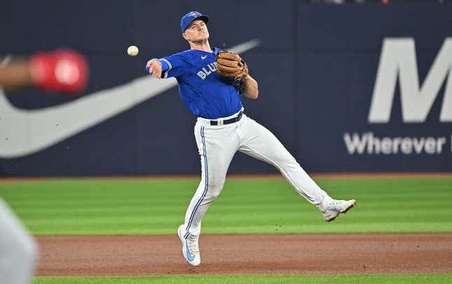 Aug 26, 2023; Toronto, Ontario, CAN;  Toronto Blue Jays third baseman Matt Chapman (26) throws to retire Cleveland Guardians left fielder Oscar Gonzalez (not shown) in the fourth inning at Rogers Centre.