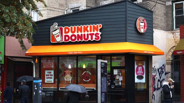 People walk past a Dunkin’ store on October 26, 2020 in New York City.