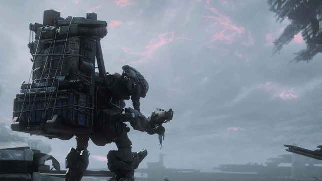 A lonely mech carries a backpack and looks out at a grey sky. 