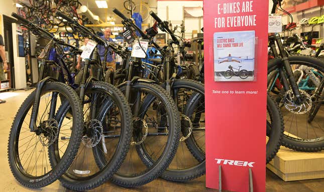 A photo of electric bikes on sale in a store.