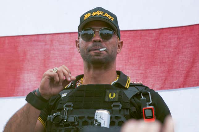 In this Sept. 26, 2020, file photo, Proud Boys leader Henry “Enrique” Tarrio wears a hat that says The War Boys during a rally in Portland, Ore. Tarrio, has been sentenced to five months in jail. Tarrio was convicted of burning a Black Lives Matter banner that was torn down from a historic Black church in downtown Washington and for bringing two high-capacity firearm magazines into the nation’s capital two days before the Jan. 6 riot.
