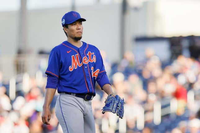 Mar 16, 2023; West Palm Beach, Florida, USA; New York Mets starting pitcher Kodai Senga (34) returns to the dugout after the second inning against the Washington Nationals at The Ballpark of the Palm Beaches.