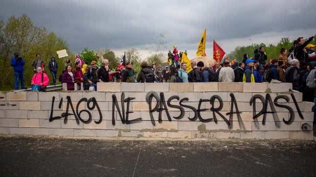 Image for article titled French Demonstrators Build an Actual Cement Wall to Protest New Highway