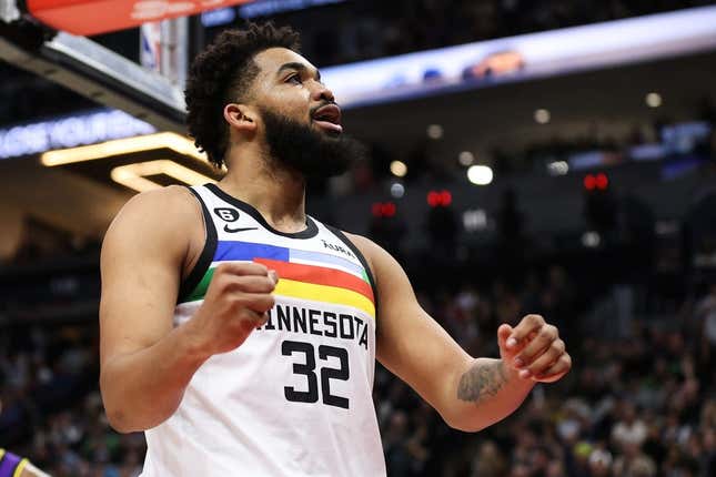 Mar 31, 2023; Minneapolis, Minnesota, USA; Minnesota Timberwolves center Karl-Anthony Towns (32) reacts to his shot against the Los Angeles Lakers during the third quarter at Target Center.