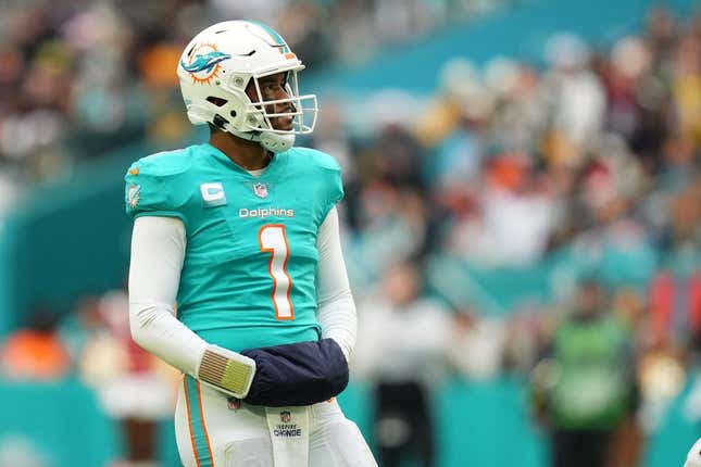 Dec 25, 2022; Miami Gardens, Florida, USA; Miami Dolphins quarterback Tua Tagovailoa (1) stands on the field during the second half against the Green Bay Packers at Hard Rock Stadium.