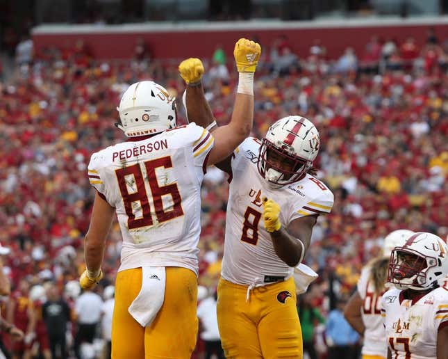 Sep 21, 2019; Ames, IA, USA; Louisiana Monroe Warhawks tight end Josh Pederson (86) and Louisiana Monroe Warhawks running back Josh Johnson (8) celebrate after a touchdown against the Iowa State Cyclones at Jack Trice Stadium.