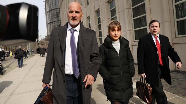 Allison Mack (c) and her lawyers 