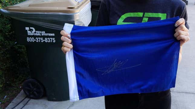 Image for article titled That Time I Asked Sebastian Vettel to Sign a Blue Flag