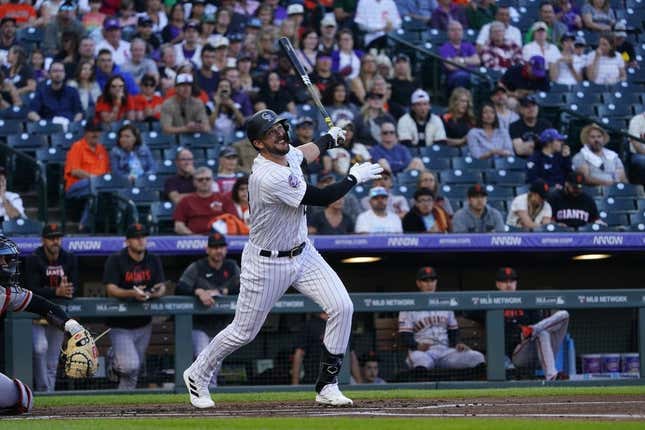 Sep 16, 2023; Denver, Colorado, USA; Colorado Rockies right fielder Kris Bryant (23) watches his RBI double to right field in the first inning at Coors Field.