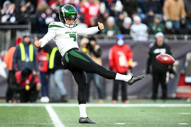 Nov 20, 2022; Foxborough, Massachusetts, USA; New York Jets punter Braden Mann (7) kicks the ball against the New England Patriots during the second half at Gillette Stadium.