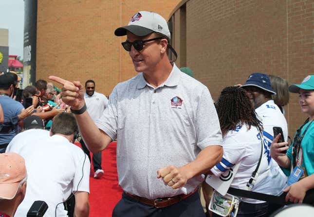 Aug 5, 2023; Canton, OH, USA; Peyton Manning arrives on the red carpet for the 2023 Pro Football Hall of Fame Enshrinement at Tom Benson Hall of Fame Stadium.