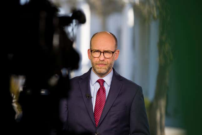 Acting director of Office of Management and Budget Russ Vought listens during a television interview at the White House, Monday, Oct. 21, 2019, in Washington. 