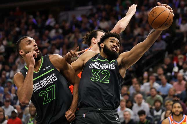 Apr 14, 2023; Minneapolis, Minnesota, USA; Minnesota Timberwolves center Karl-Anthony Towns (32) rebounds the ball against the Oklahoma City Thunder during the second quarter at Target Center.