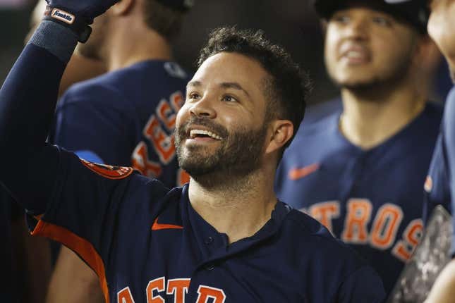 Sep 5, 2023; Arlington, Texas, USA; Houston Astros second baseman Jose Altuve (27) is congratulated by his teammates after hitting a solo home run in the first inning against the Texas Rangers at Globe Life Field.