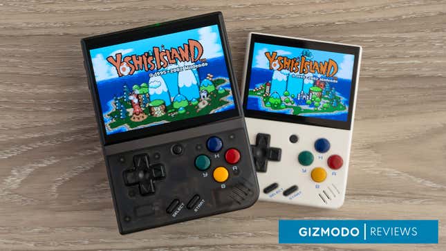 The Miyoo Mini Plus sitting on top of the Miyoo Mini on a wooden table, with both devices showing Yoshi's Island on screen.