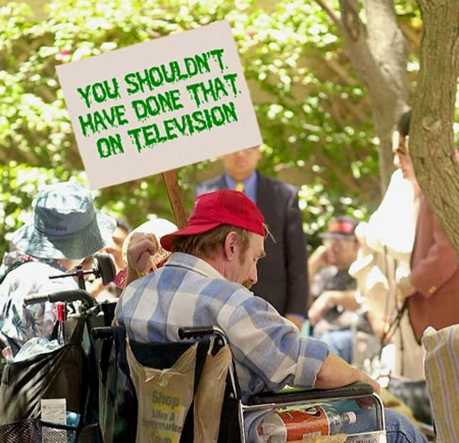 A Green Slime Syndrome sufferer protests outside of Nickelodeon's New York headquarters.